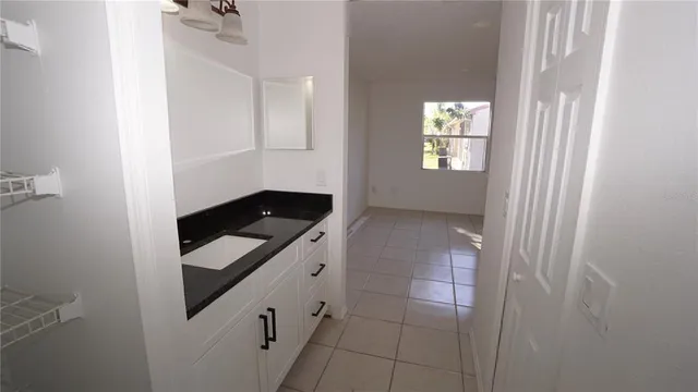 a view of an empty room and window
