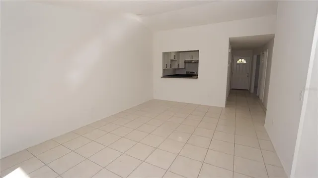 an empty room with a bathroom
