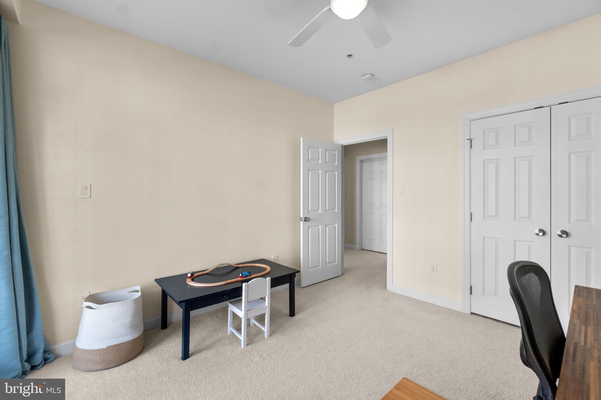 9504 Hyde Place Frederick, MD 21704 - Photo 23 of 43 a room with furniture and a window