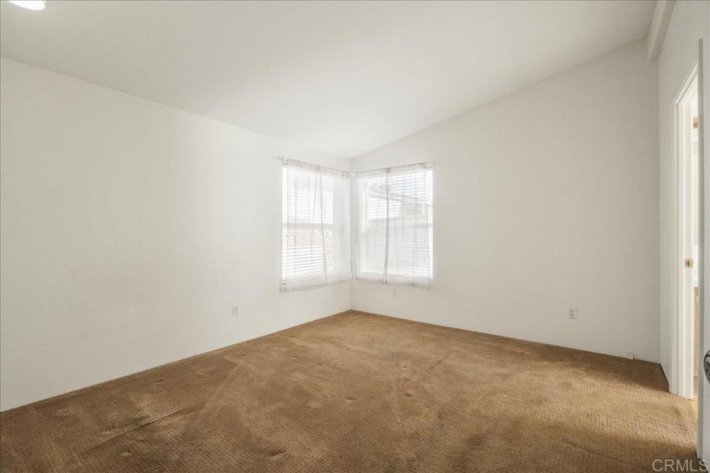 13941 Wisteria Avenue, Unit 53 Poway, CA 92064 - Photo 28 of 28 an empty room with windows