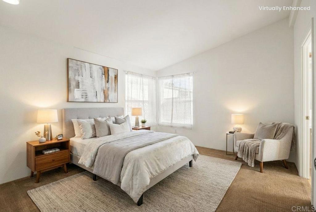 13941 Wisteria Avenue, Unit 53 Poway, CA 92064 - Photo 4 of 28 a bedroom with a bed and window