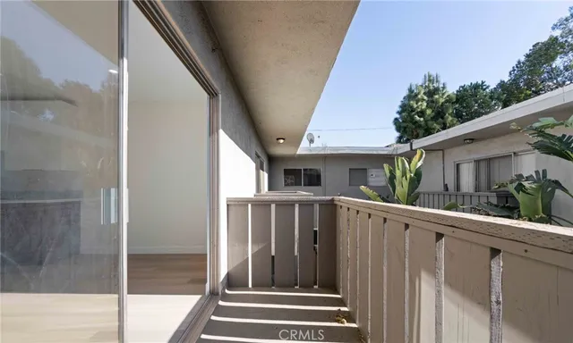 a room with a sink and cabinets