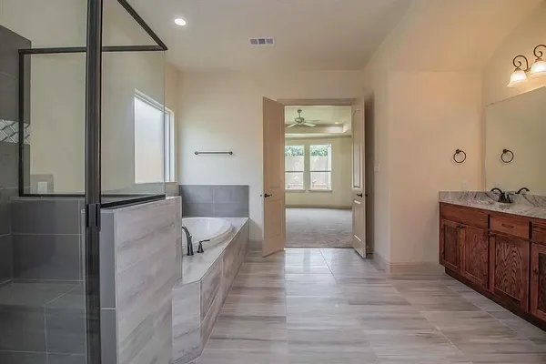 a view of a bathroom from the hallway