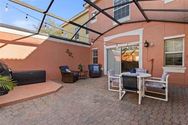 a view of a lake with couches and city view