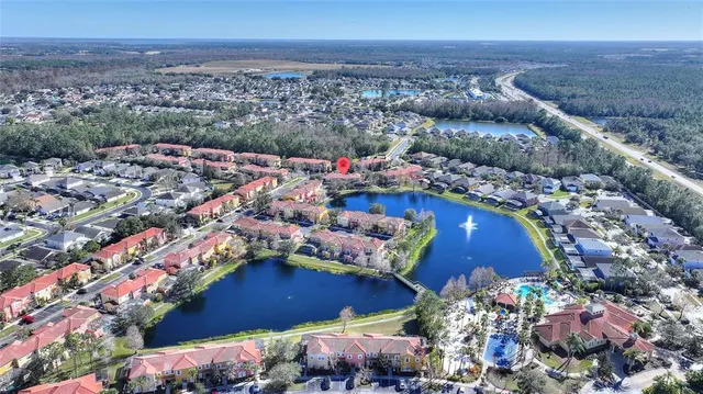 an aerial view of a house with a garden