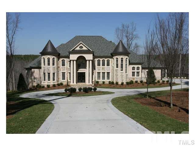 11229 Conley Cove Court Raleigh, NC 27613 - Photo 3 of 22 a front view of a house with a yard
