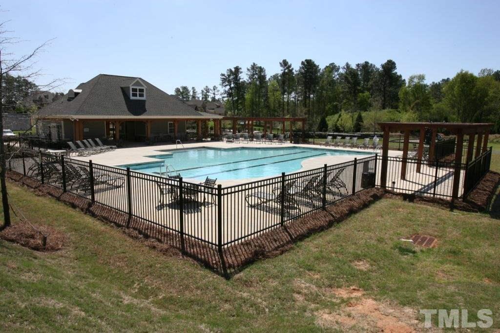 11229 Conley Cove Court Raleigh, NC 27613 - Photo 22 of 22 a view of a terrace with a small yard