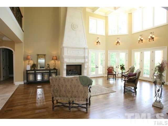11229 Conley Cove Court Raleigh, NC 27613 - Photo 9 of 22 a living room with furniture and a fireplace