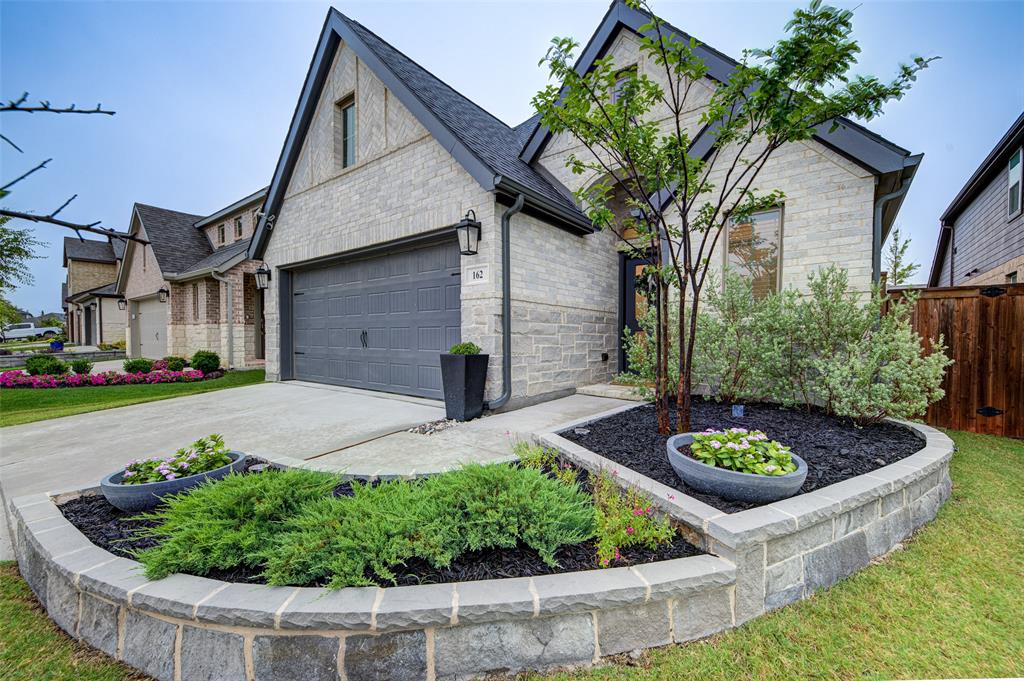 162 Palo Duro Bend Rhome, TX 76078 - Photo 2 of 25 Gorgeous curb appeal