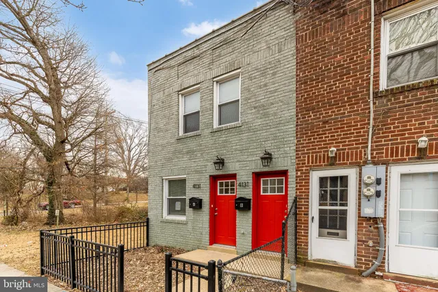a building view with a brick wall