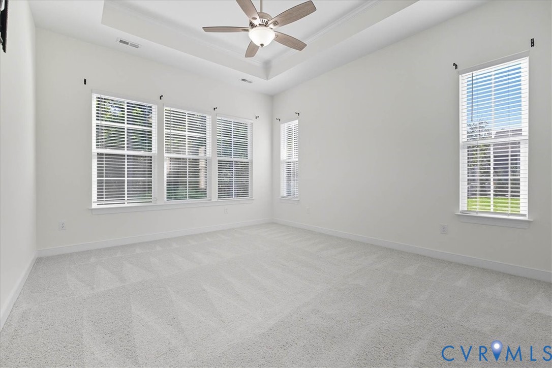 1813 Twin Rivers Court Chester, VA 23836 - Photo 12 of 33 The primary bedroom measures 14'x15', offers a tra