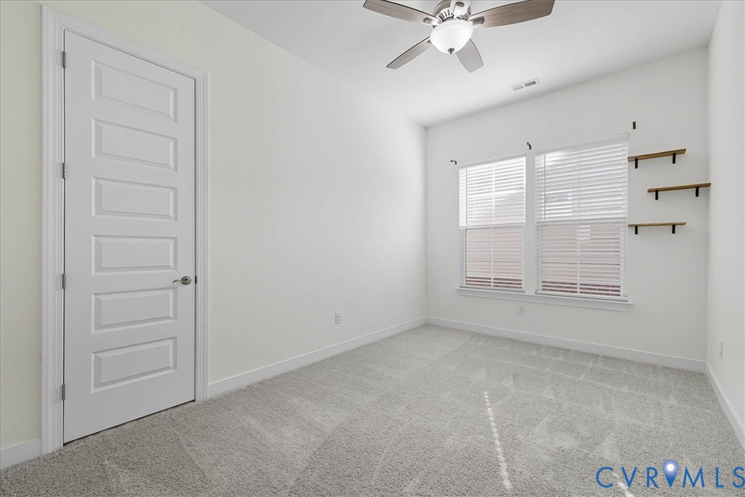 1813 Twin Rivers Court Chester, VA 23836 - Photo 17 of 33 The second bedroom measures 14'x10' and offers an