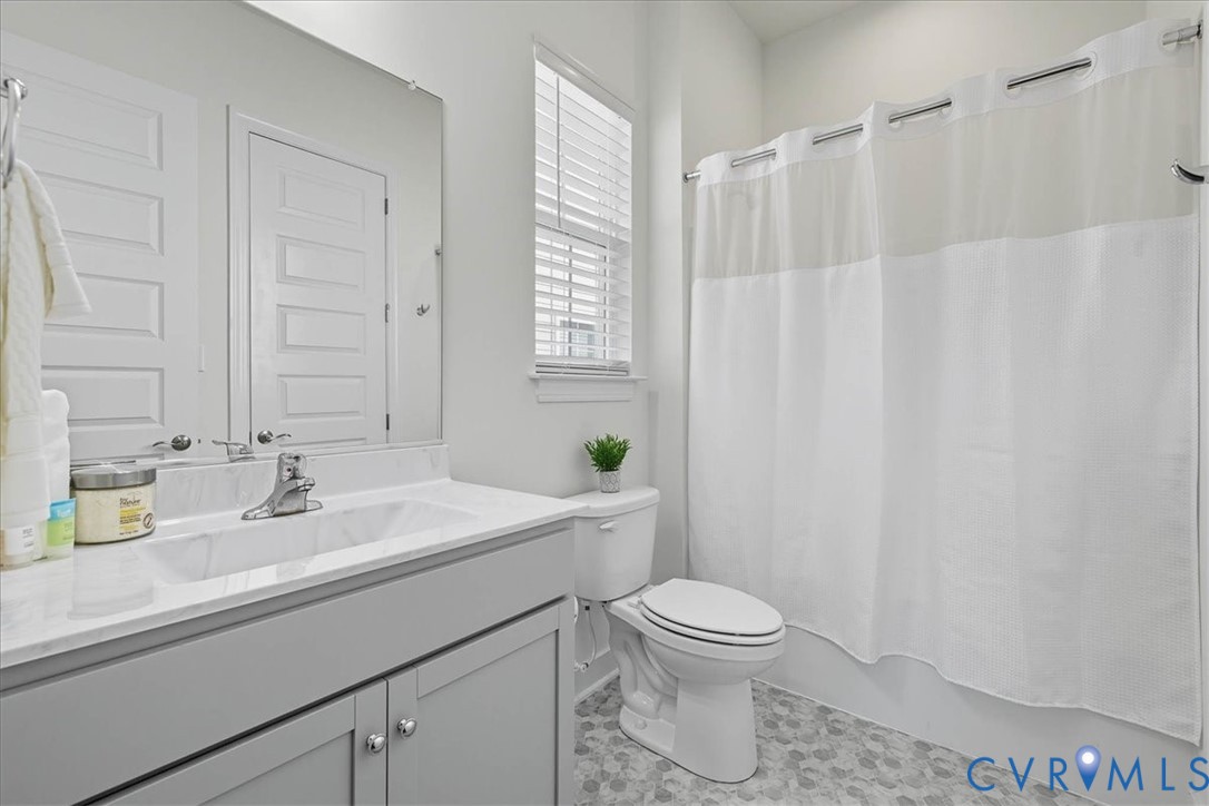 1813 Twin Rivers Court Chester, VA 23836 - Photo 20 of 33 The hall bathroom is perfect for guests.