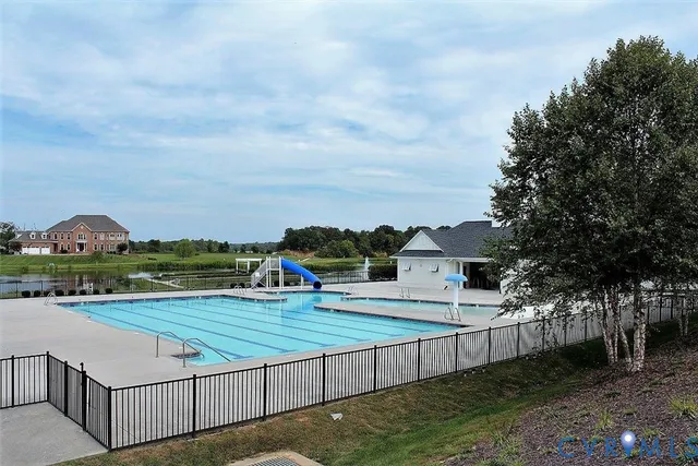 a view of a big yard with an outdoor space