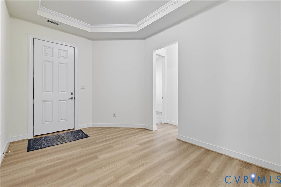 1813 Twin Rivers Court Chester, VA 23836 - Photo 4 of 33 The spacious foyer vinyl plank flooring and a tray