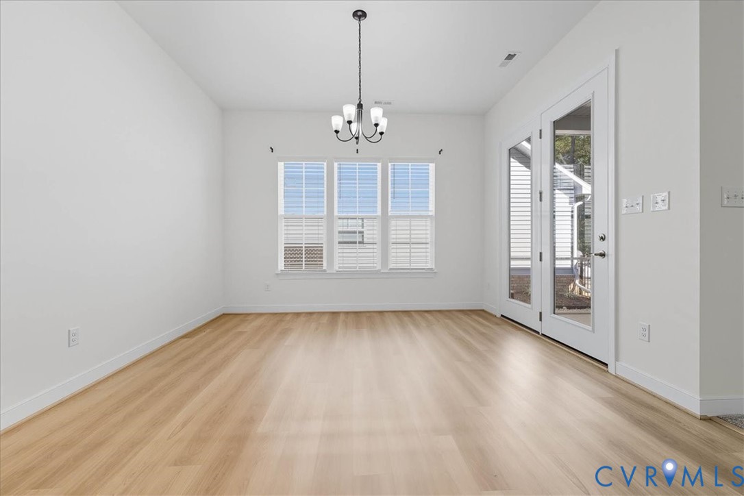 1813 Twin Rivers Court Chester, VA 23836 - Photo 10 of 33 The dining area offers access to the screened porc