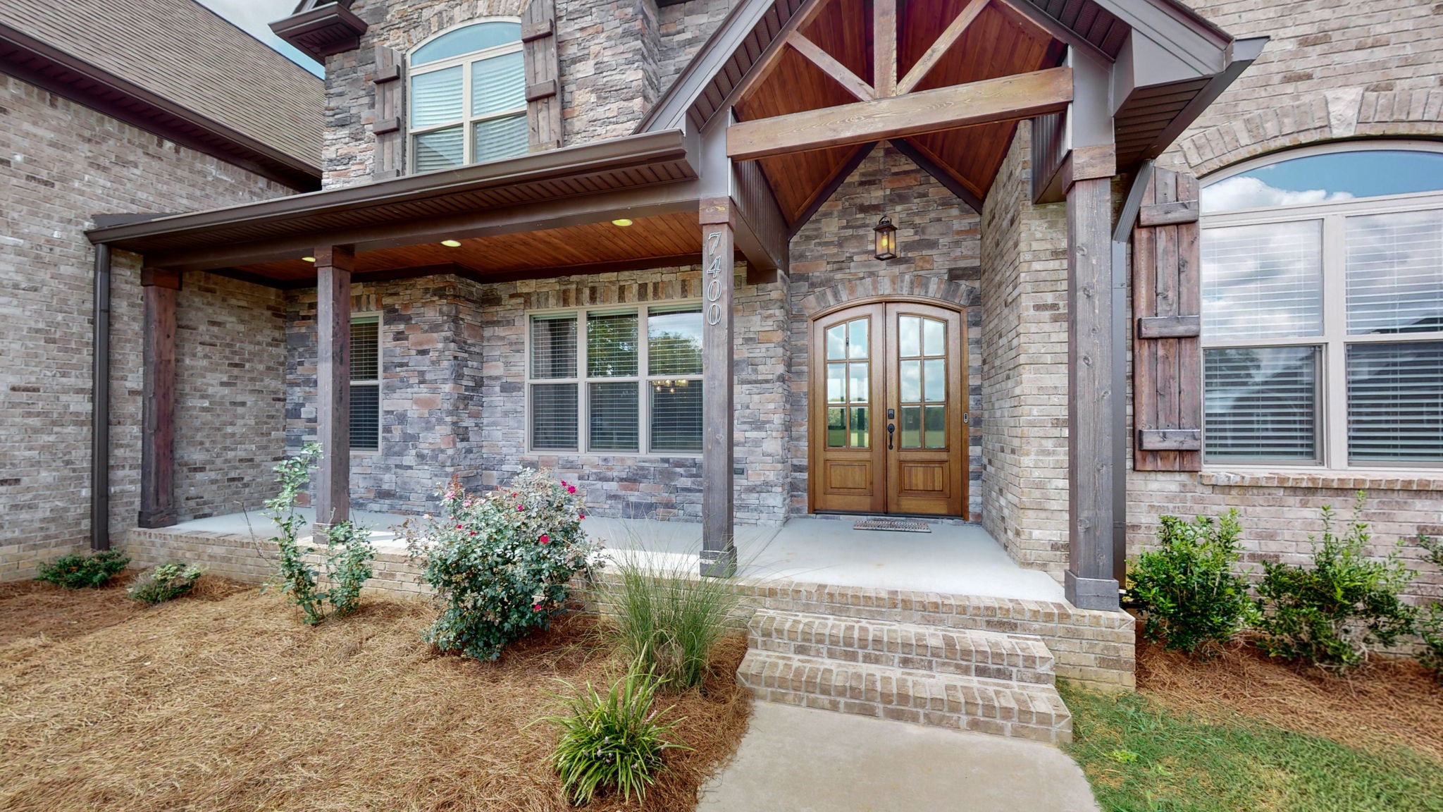 7400 Cedar Forest Road Lebanon, TN 37090 - Photo 3 of 70 a front view of a house with garden