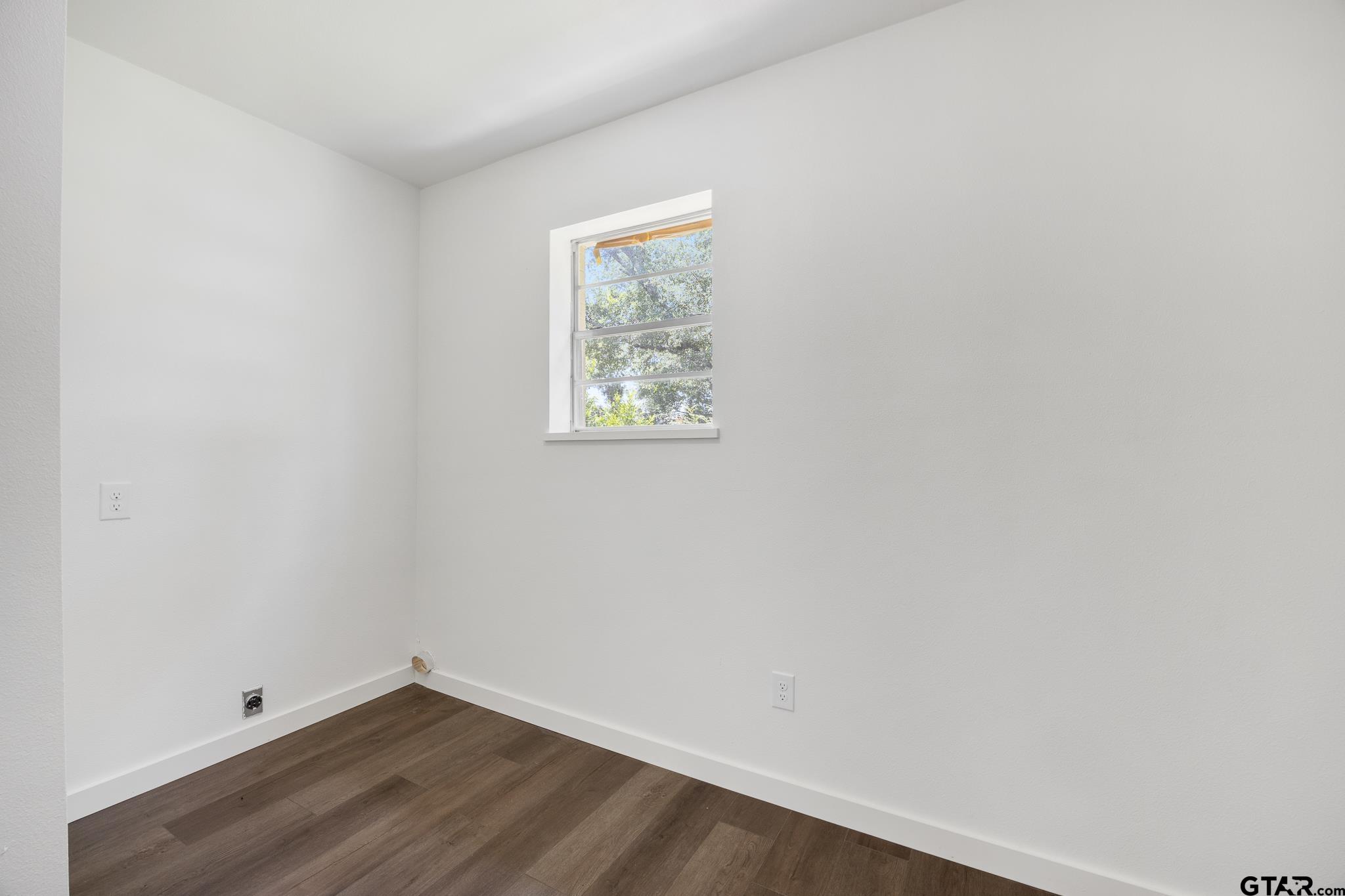 1538 North Hill Road Tyler, TX 75702 - Photo 16 of 29 an empty room with a window