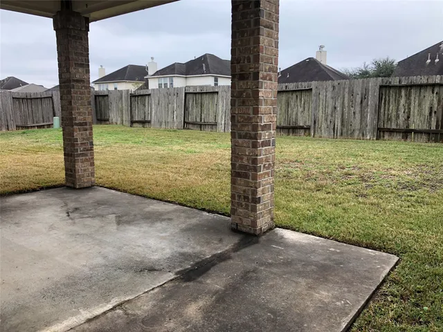 a view of a room with a large window