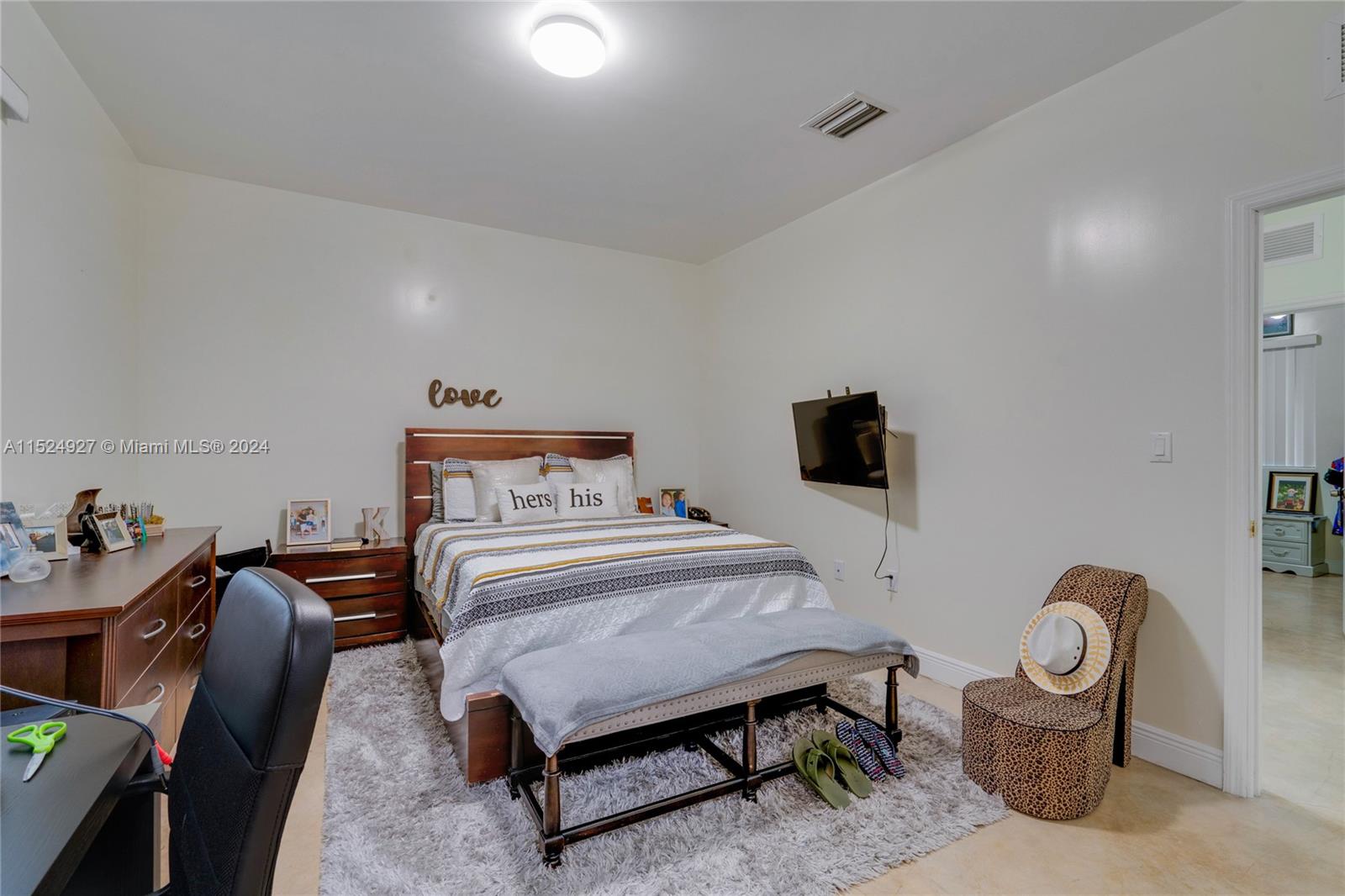 10129 West Jessamine Street Miami, FL 33157 - Photo 20 of 50 a bedroom with a bed and wooden floor