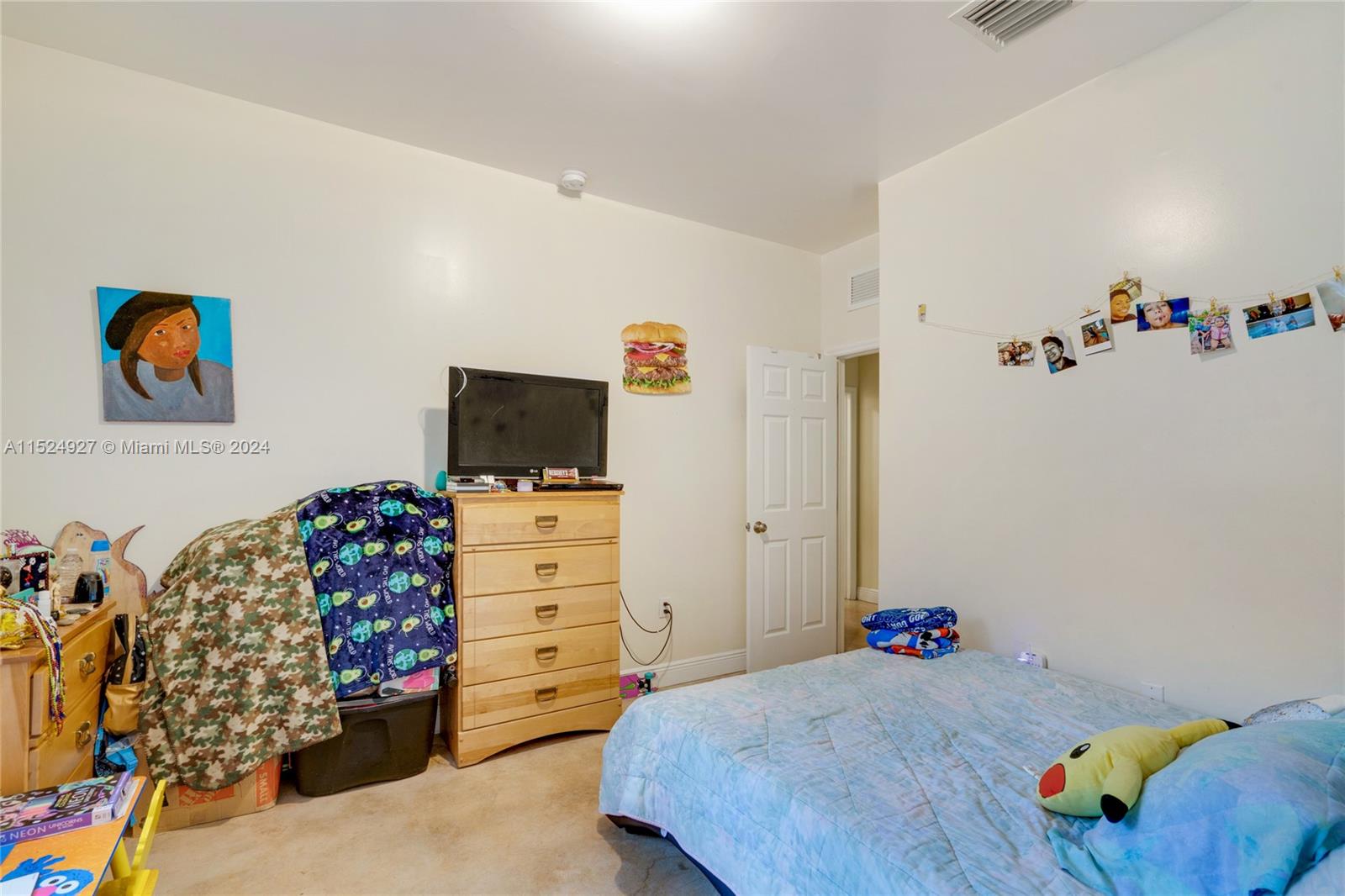 10129 West Jessamine Street Miami, FL 33157 - Photo 38 of 50 a bedroom with a bed and furniture