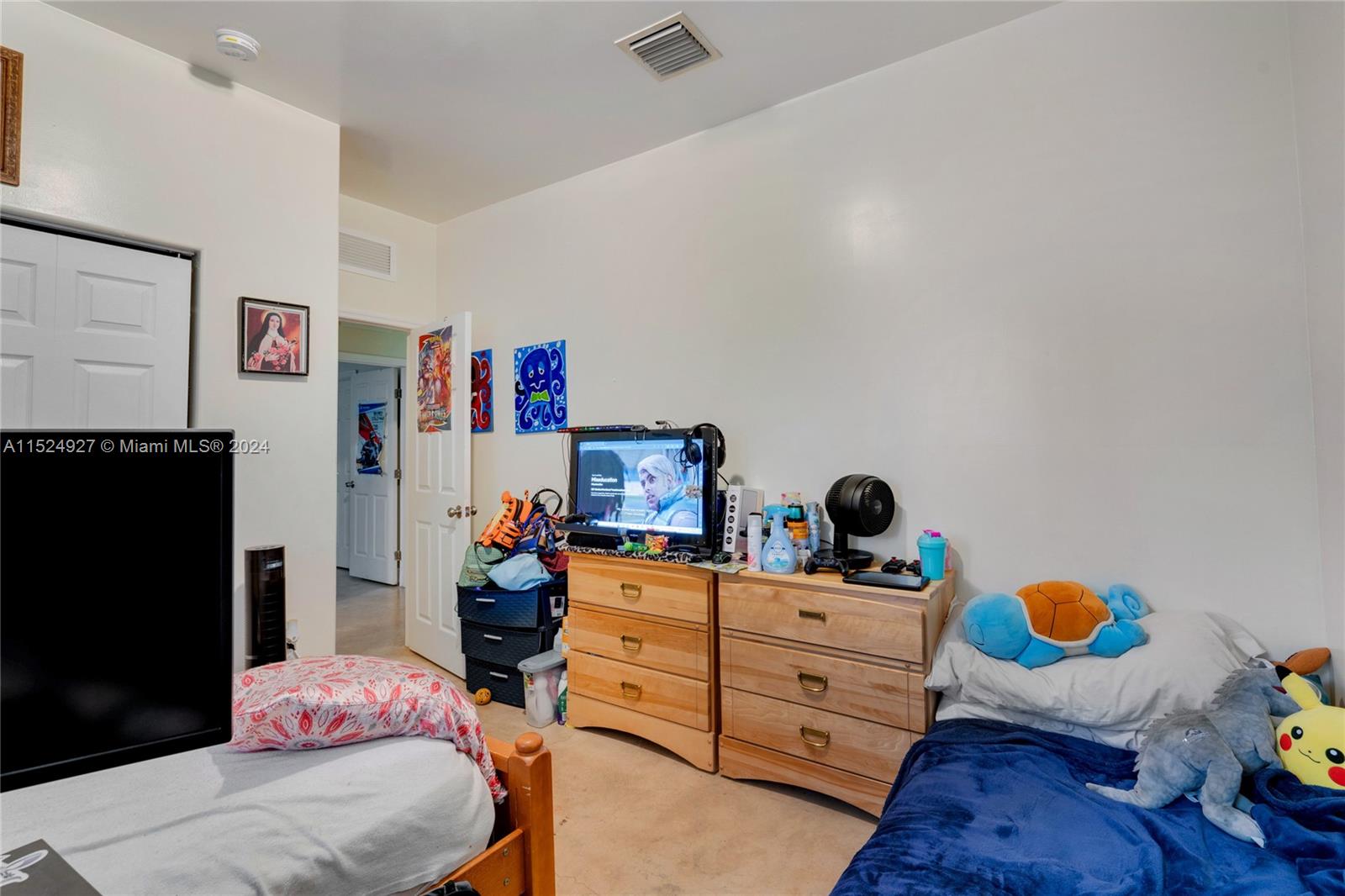 10129 West Jessamine Street Miami, FL 33157 - Photo 40 of 50 a bedroom with a bed and wooden floor