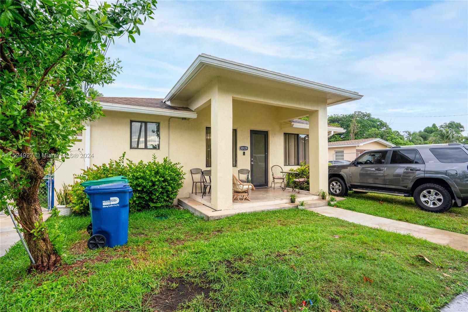 10129 West Jessamine Street Miami, FL 33157 - Photo 5 of 50 a view of a house with sitting area and garden