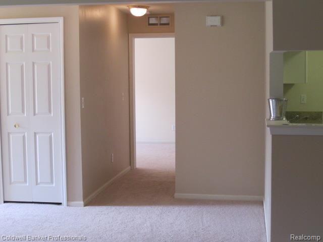 3384 Tremonte Circle, Unit 178 Rochester, MI 48306 - Photo 8 of 37 Thru DR to Entry & Guest Room