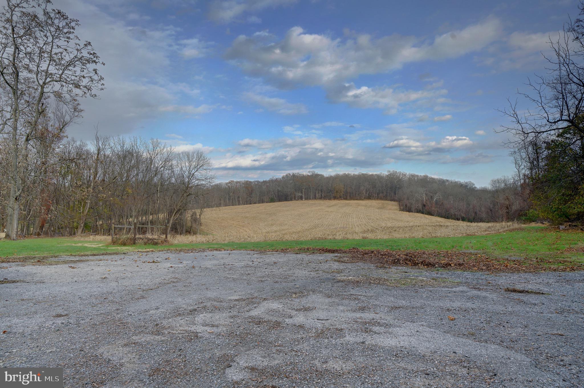 2793 Pfefferkorn Road, Unit D West Friendship, MD 21794 - Photo 23 of 24 a view of a field with trees in background