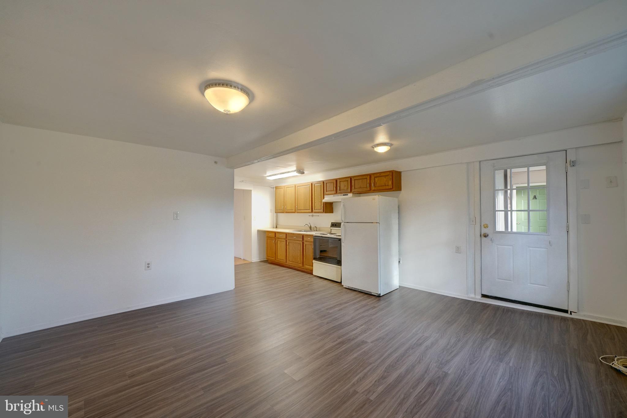 2793 Pfefferkorn Road, Unit D West Friendship, MD 21794 - Photo 5 of 24 a view of a kitchen with a sink and a window