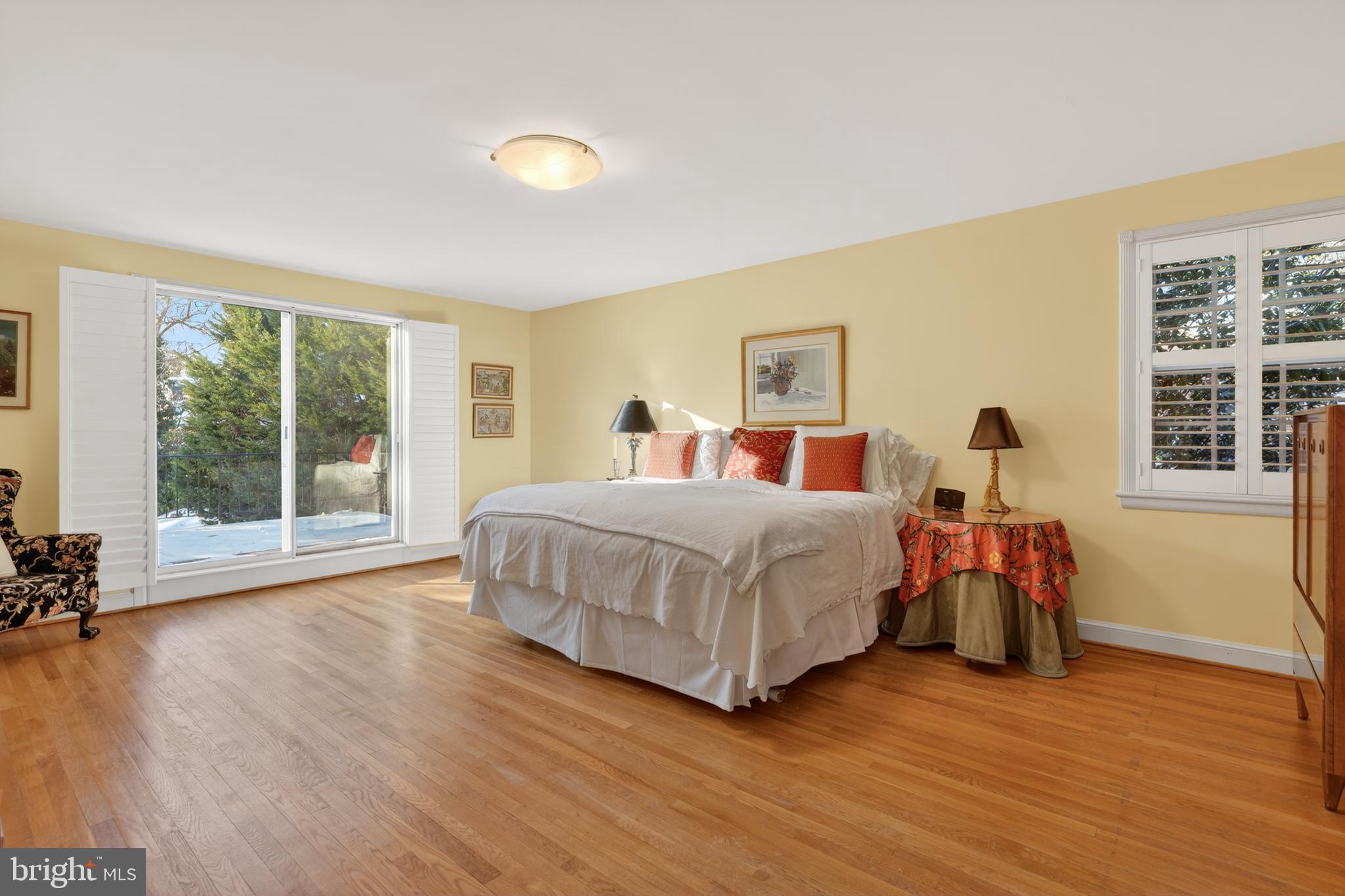 2238 47th Street Northwest Washington, DC 20007 - Photo 18 of 42 a bedroom with a bed and a large window