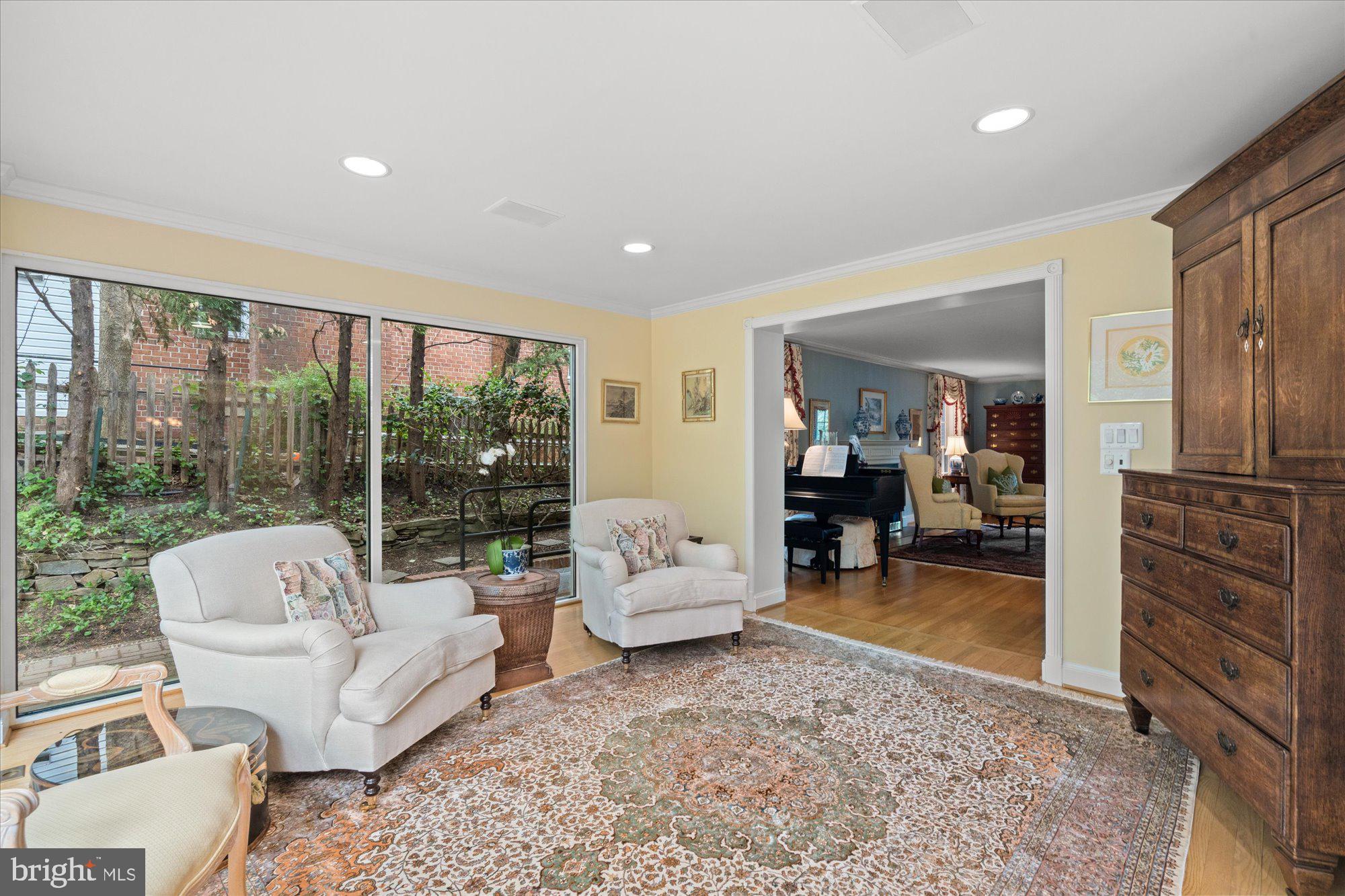 2238 47th Street Northwest Washington, DC 20007 - Photo 22 of 67 a living room with furniture and a large window