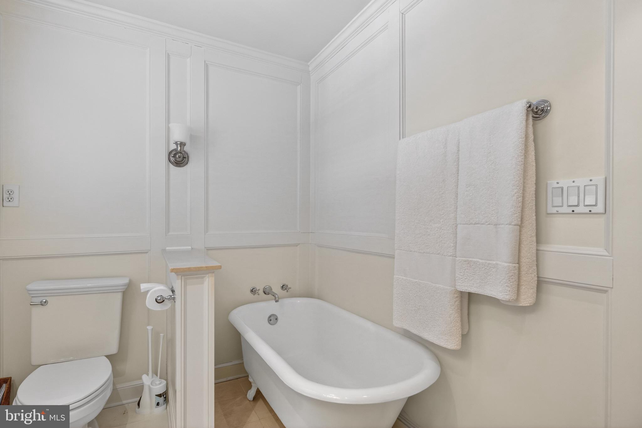 2238 47th Street Northwest Washington, DC 20007 - Photo 22 of 42 a bathroom with a toilet and a bathtub