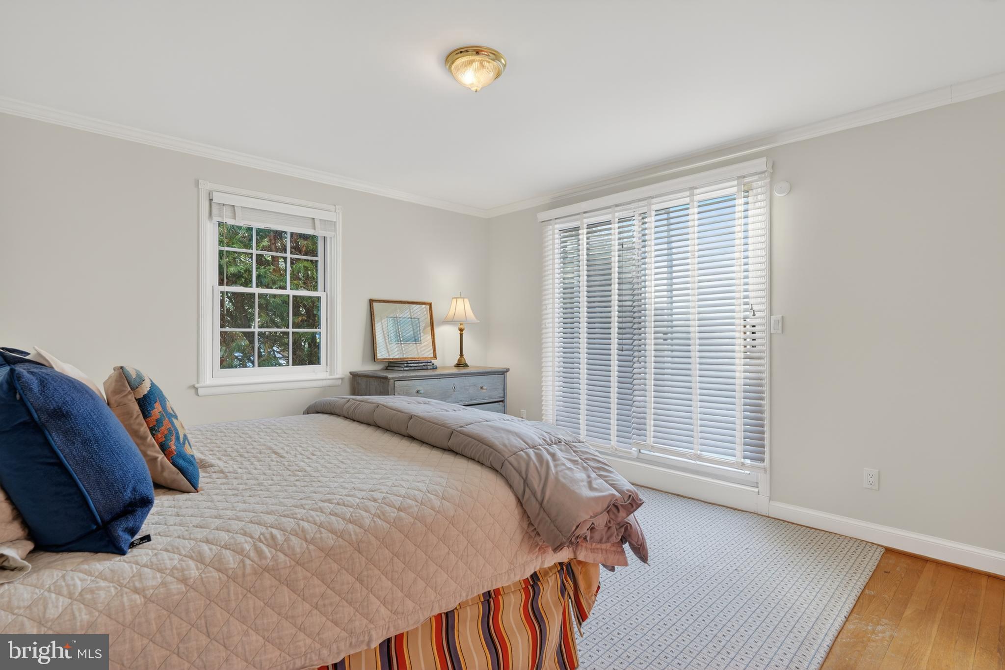 2238 47th Street Northwest Washington, DC 20007 - Photo 24 of 42 a bedroom with a bed and a large window