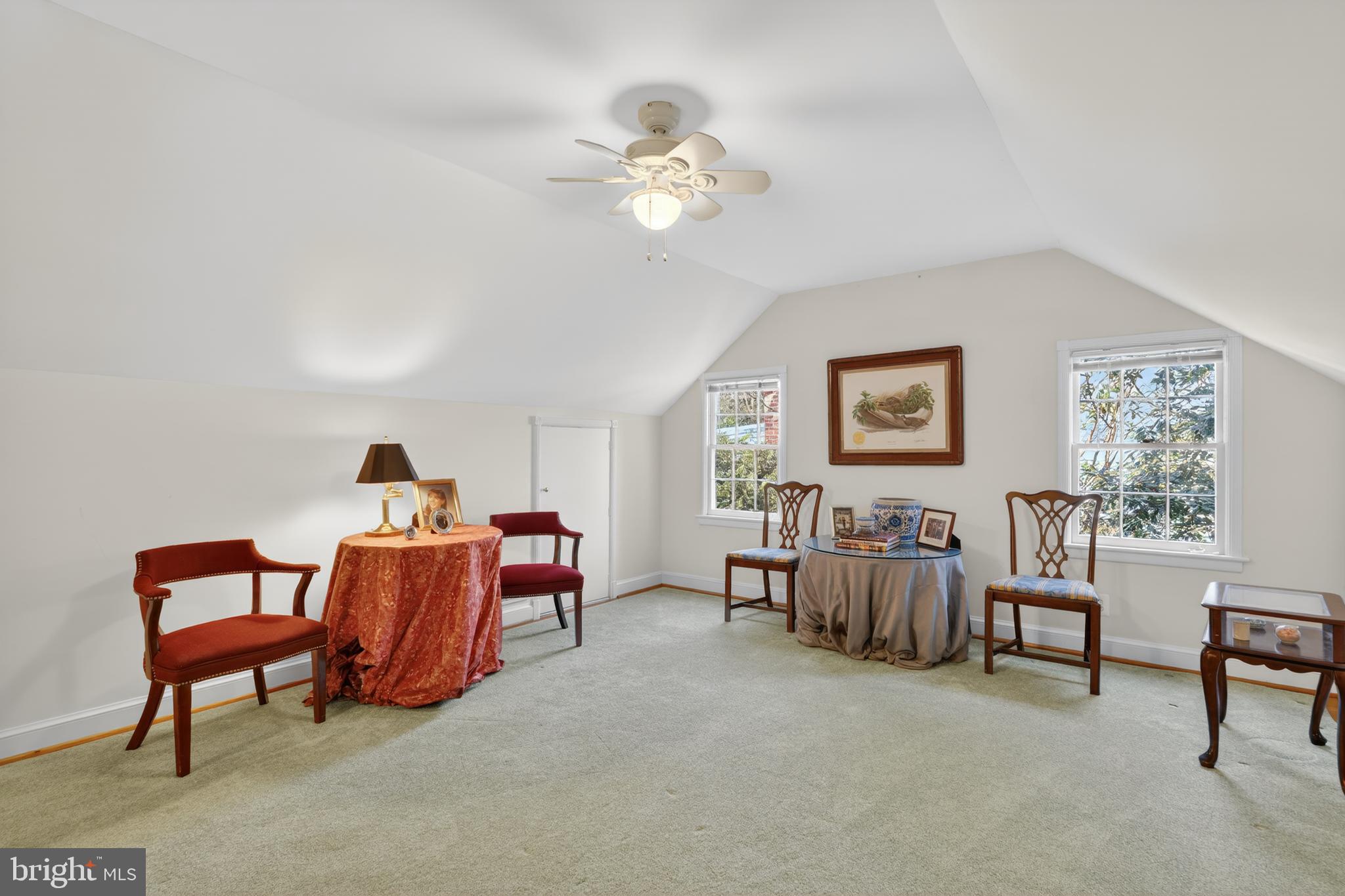 2238 47th Street Northwest Washington, DC 20007 - Photo 29 of 42 a living room with furniture and a chandelier