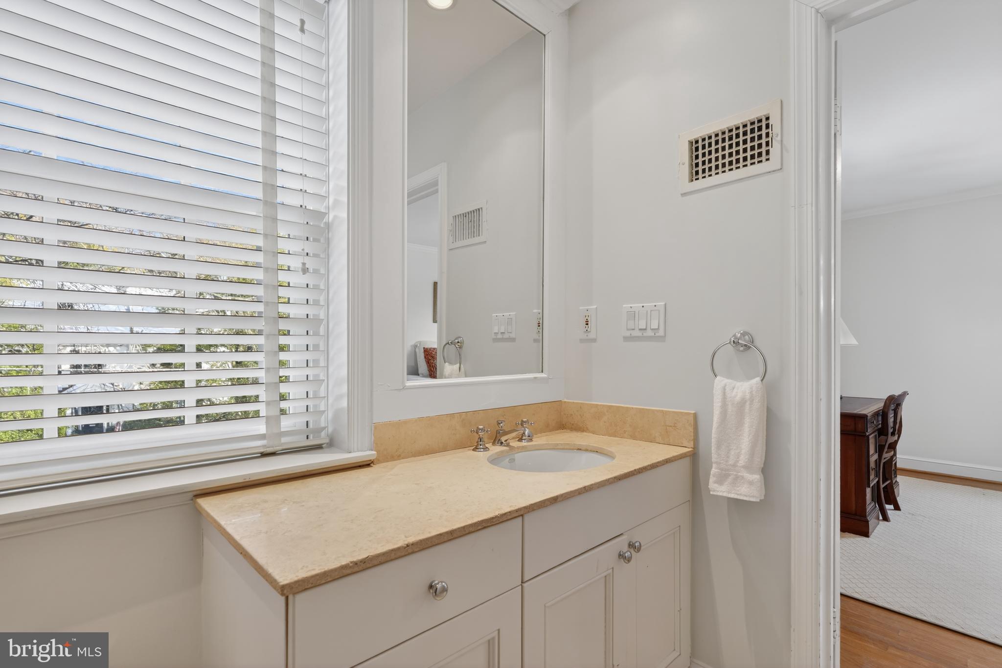 2238 47th Street Northwest Washington, DC 20007 - Photo 31 of 42 a bathroom with a sink vanity and tub