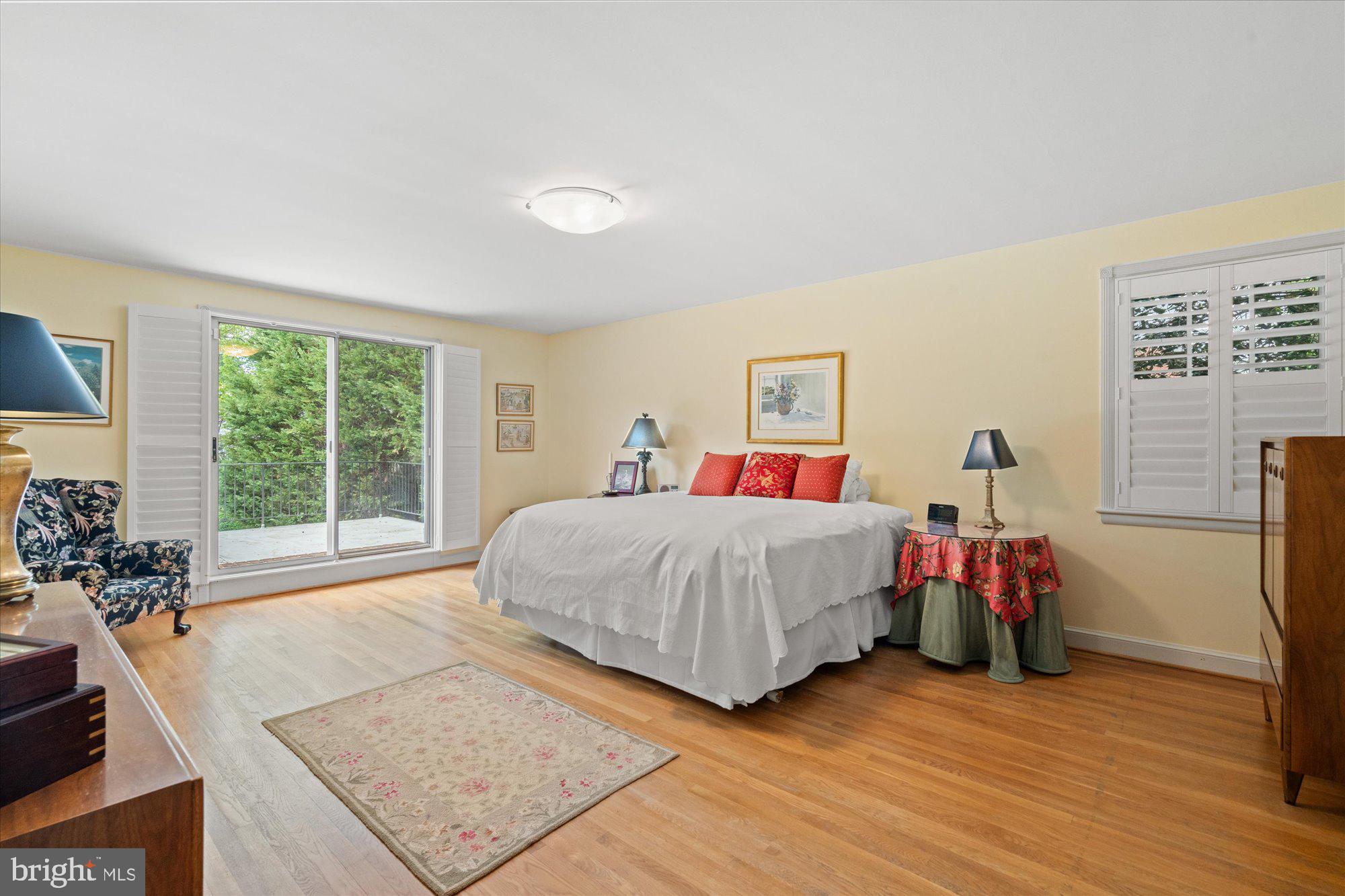 2238 47th Street Northwest Washington, DC 20007 - Photo 36 of 67 a bedroom with a bed and a large window