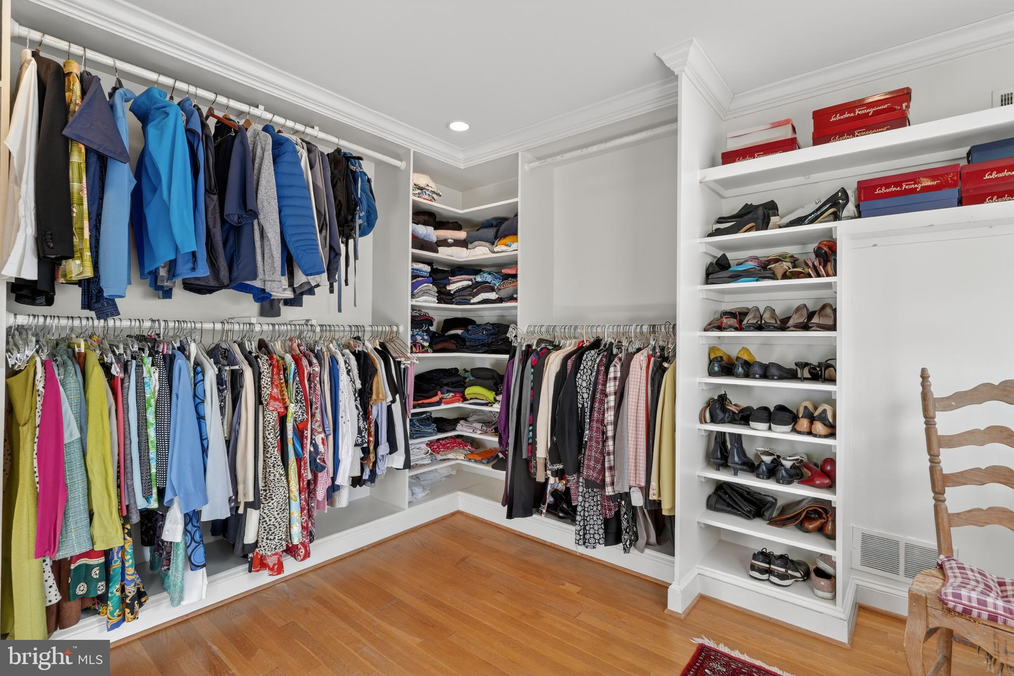 2238 47th Street Northwest Washington, DC 20007 - Photo 40 of 67 a view of walk in closet with clothes and shoes