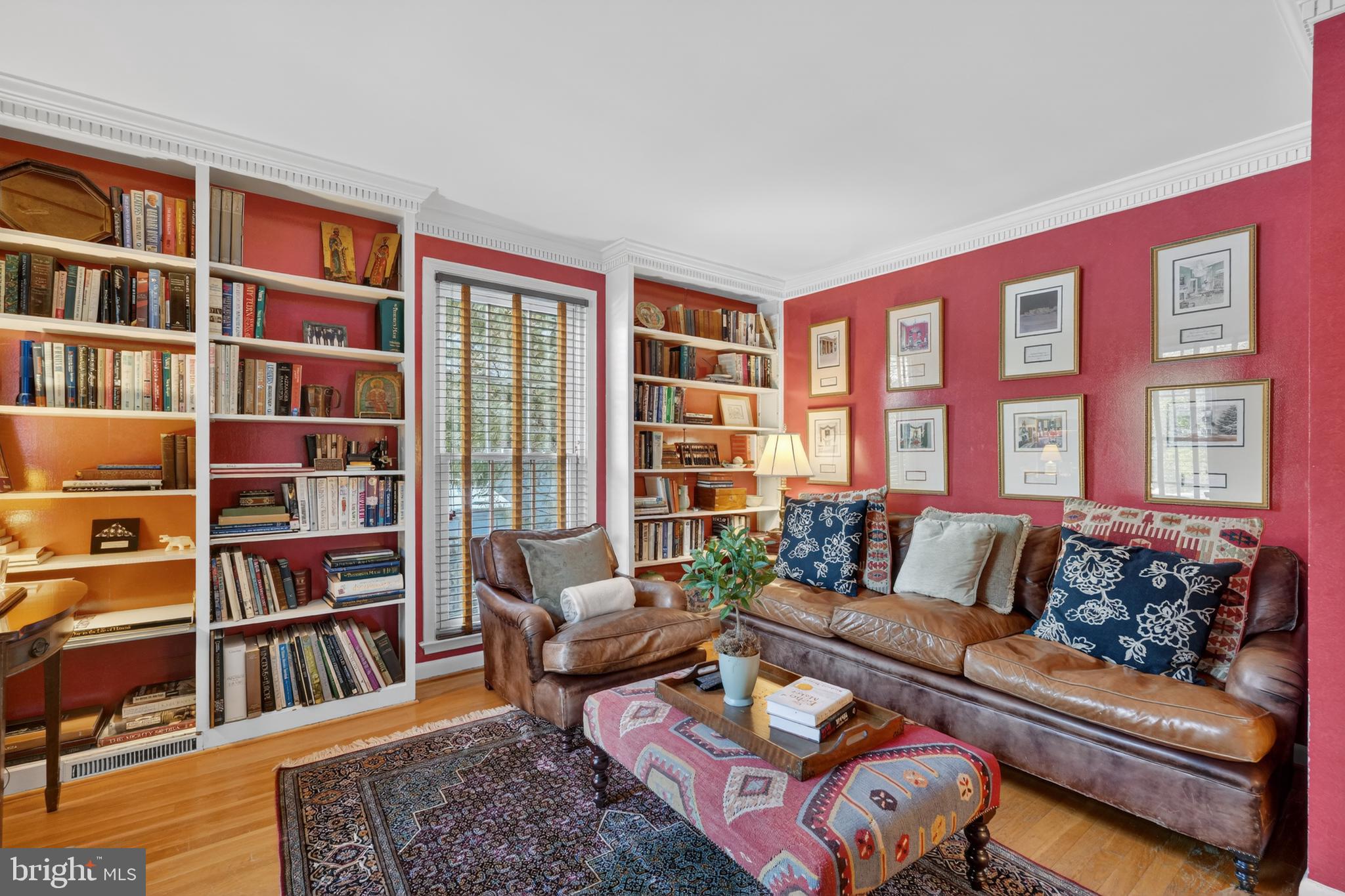 2238 47th Street Northwest Washington, DC 20007 - Photo 4 of 42 a living room with furniture and a book shelf