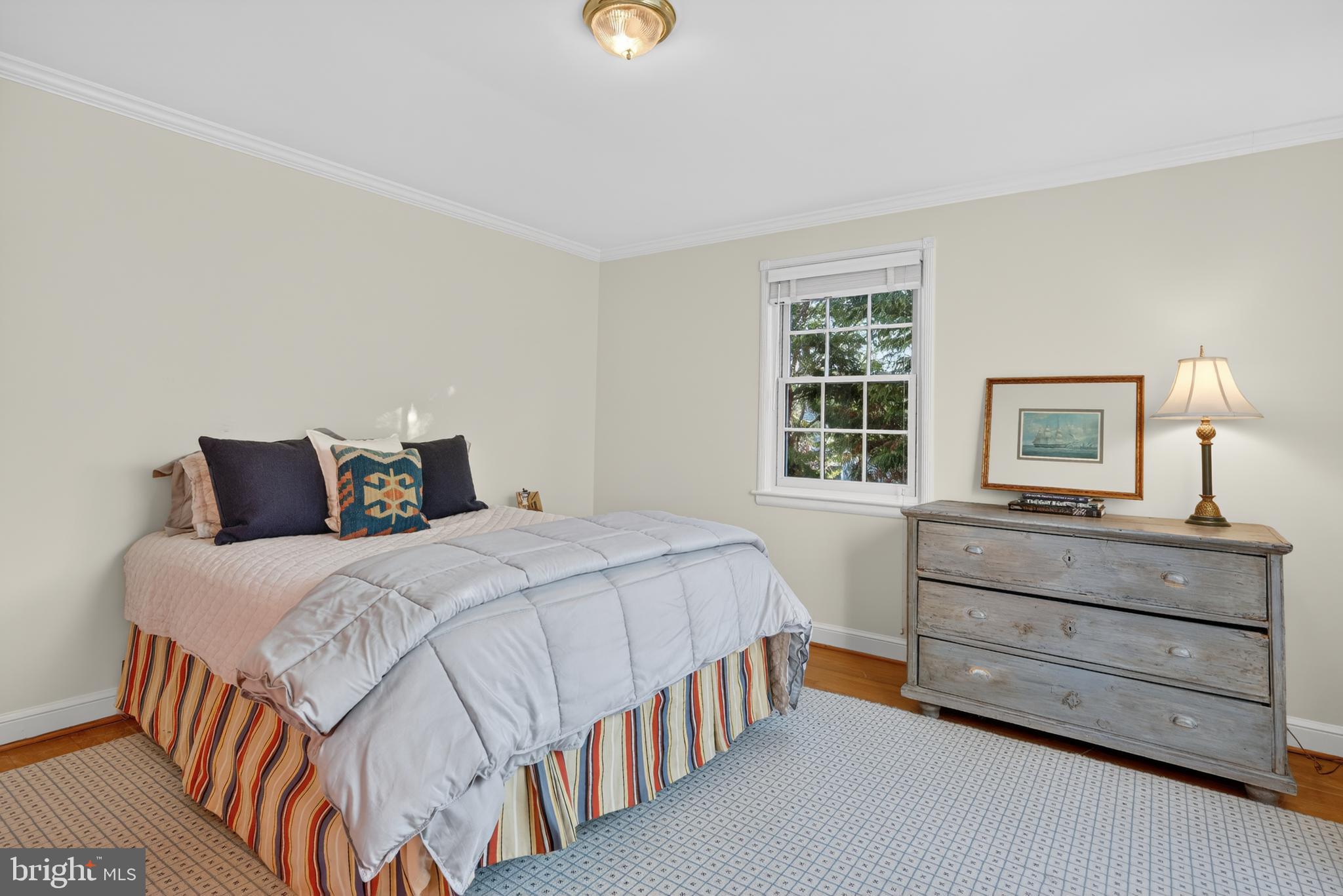 2238 47th Street Northwest Washington, DC 20007 - Photo 41 of 67 a bedroom with a bed and a window