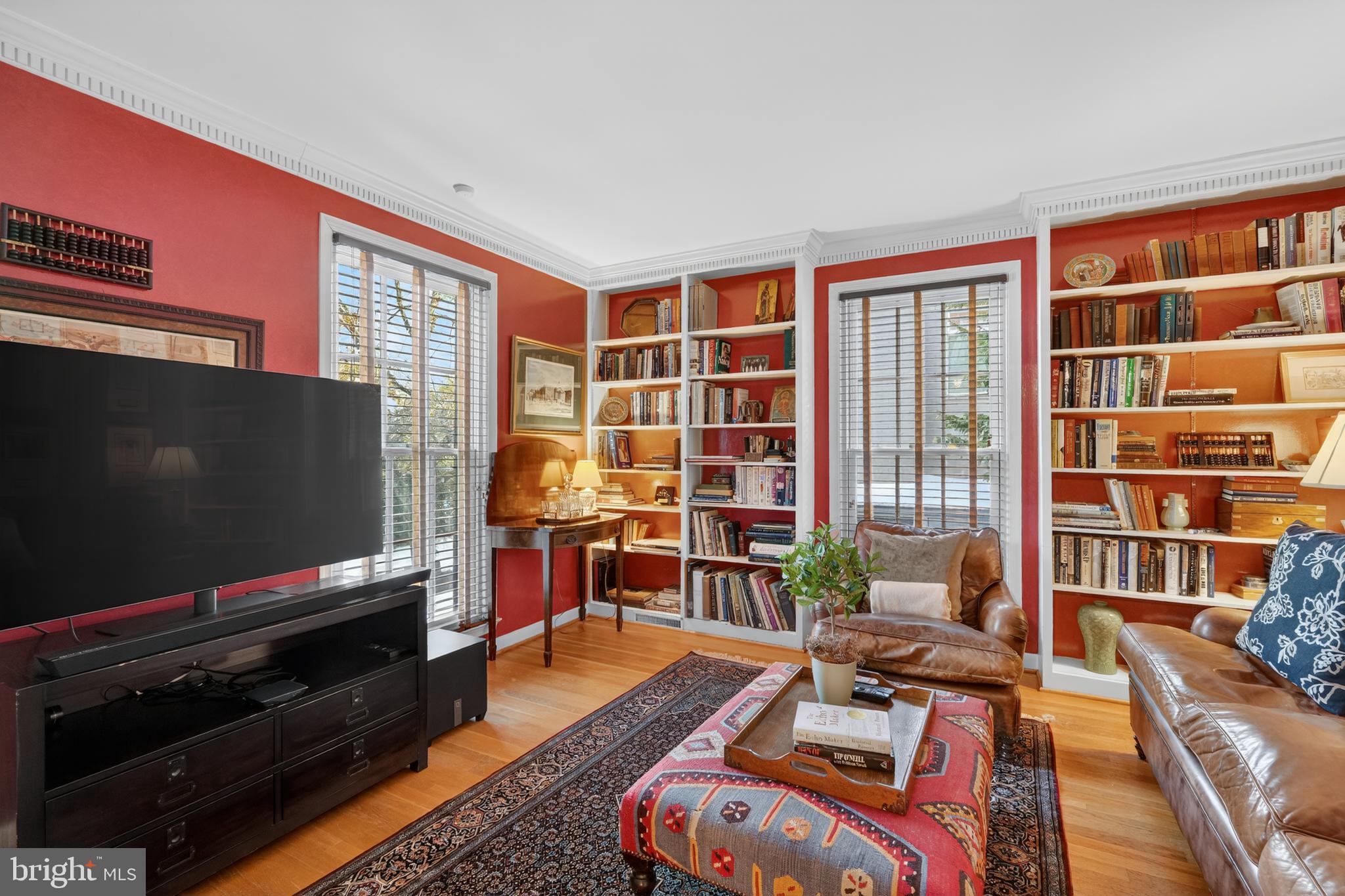2238 47th Street Northwest Washington, DC 20007 - Photo 5 of 42 a living room with furniture and a flat screen tv