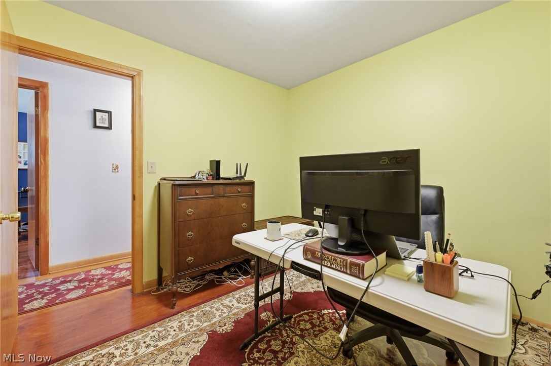 1499 Morris Road Kent, OH 44240 - Photo 16 of 41 Room featuring wood-finish flooring, light yellow walls, and a recessed ceiling light