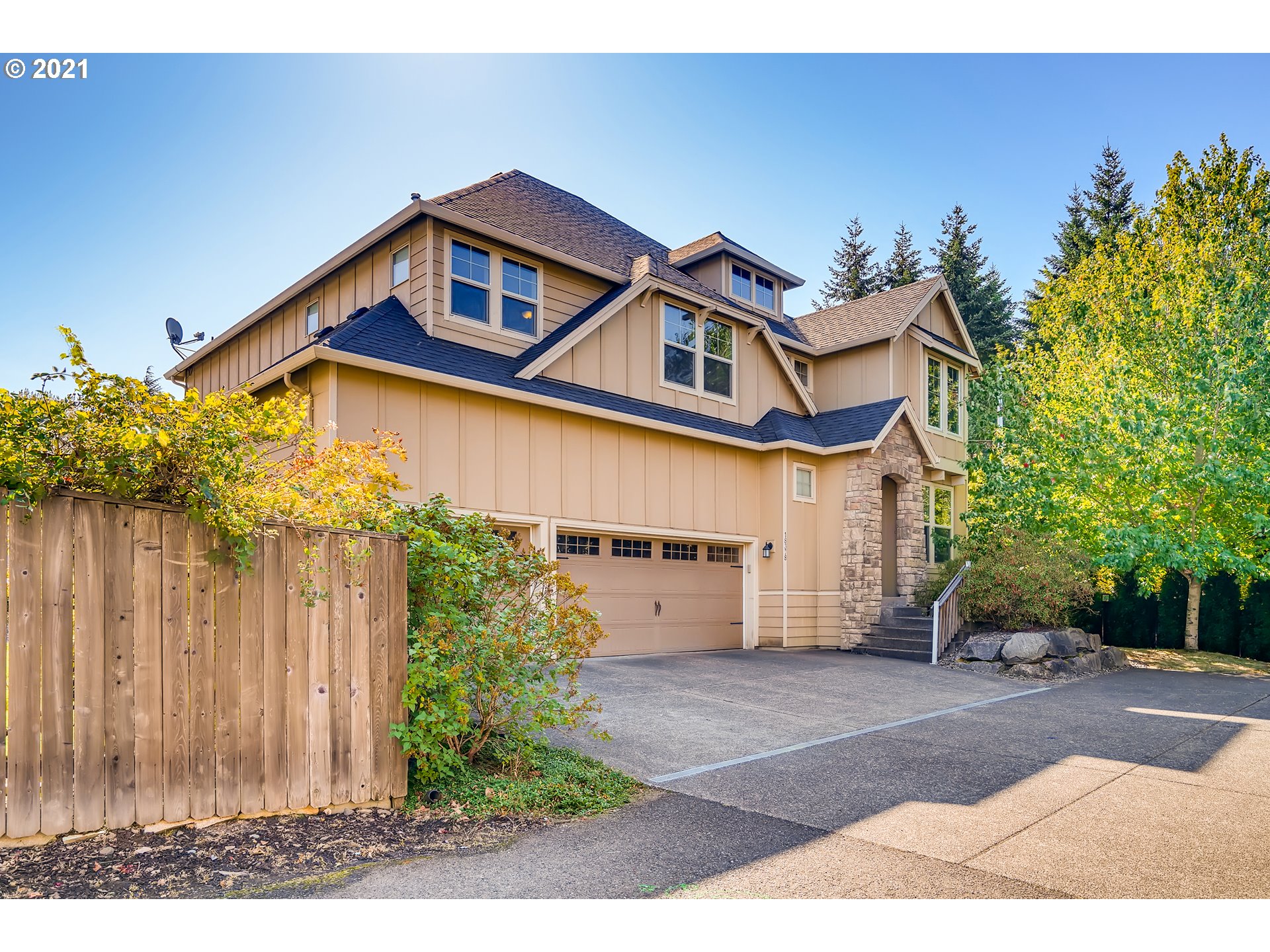 18378 Southwest Jeremy Street Beaverton, OR 97007 - Photo 3 of 31 a view of a house with a yard and plants
