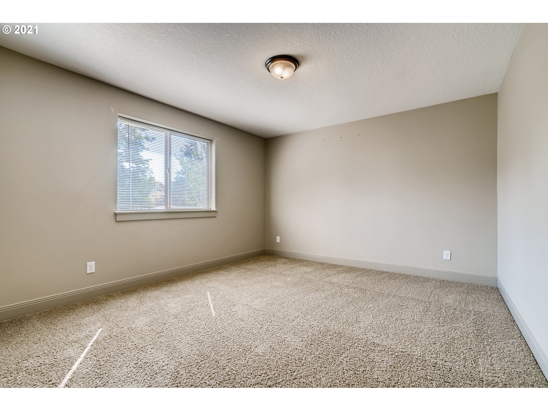 18378 Southwest Jeremy Street Beaverton, OR 97007 - Photo 25 of 31 a view of an empty room with a window