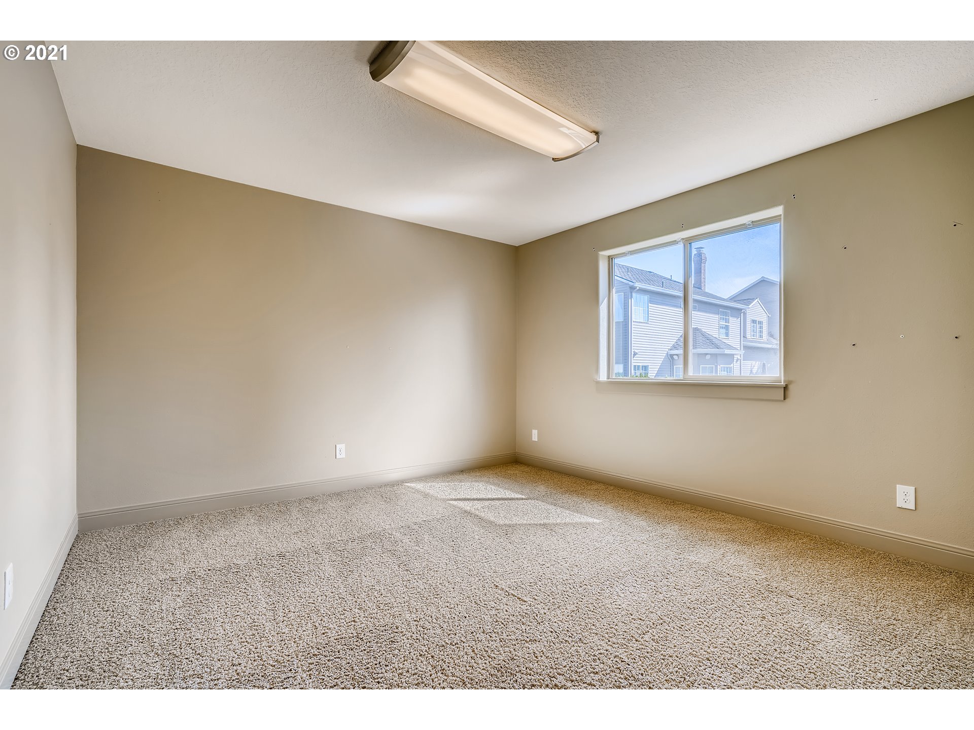 18378 Southwest Jeremy Street Beaverton, OR 97007 - Photo 26 of 31 a view of an empty room with a window