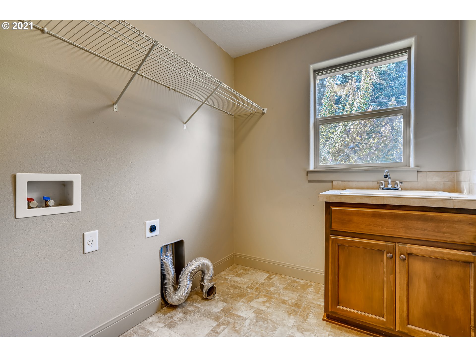 18378 Southwest Jeremy Street Beaverton, OR 97007 - Photo 28 of 31 a bathroom with a sink and a mirror