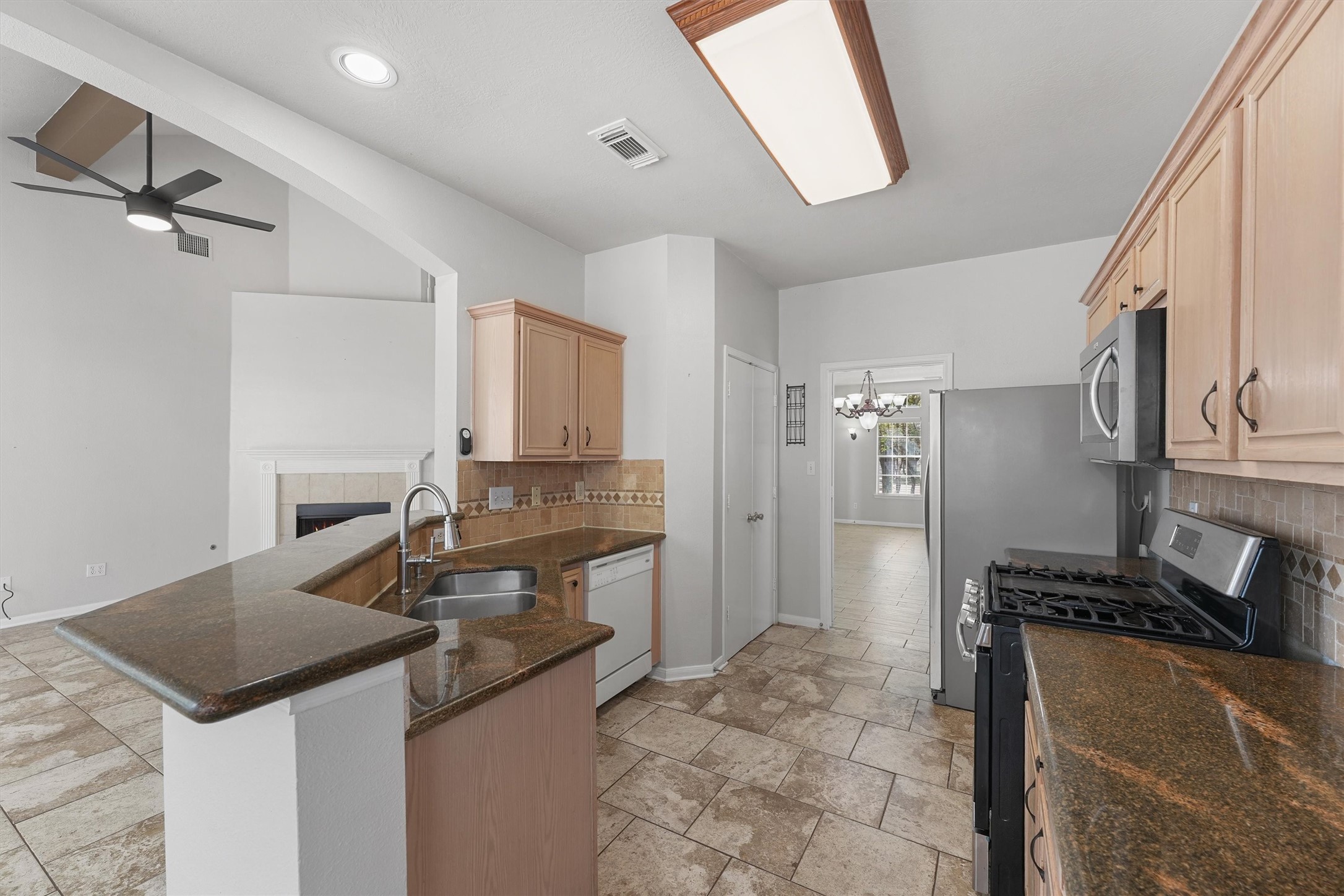 17206 Stonebridge Trail Houston, TX 77095 - Photo 9 of 28 Kitchen opens to Living Room