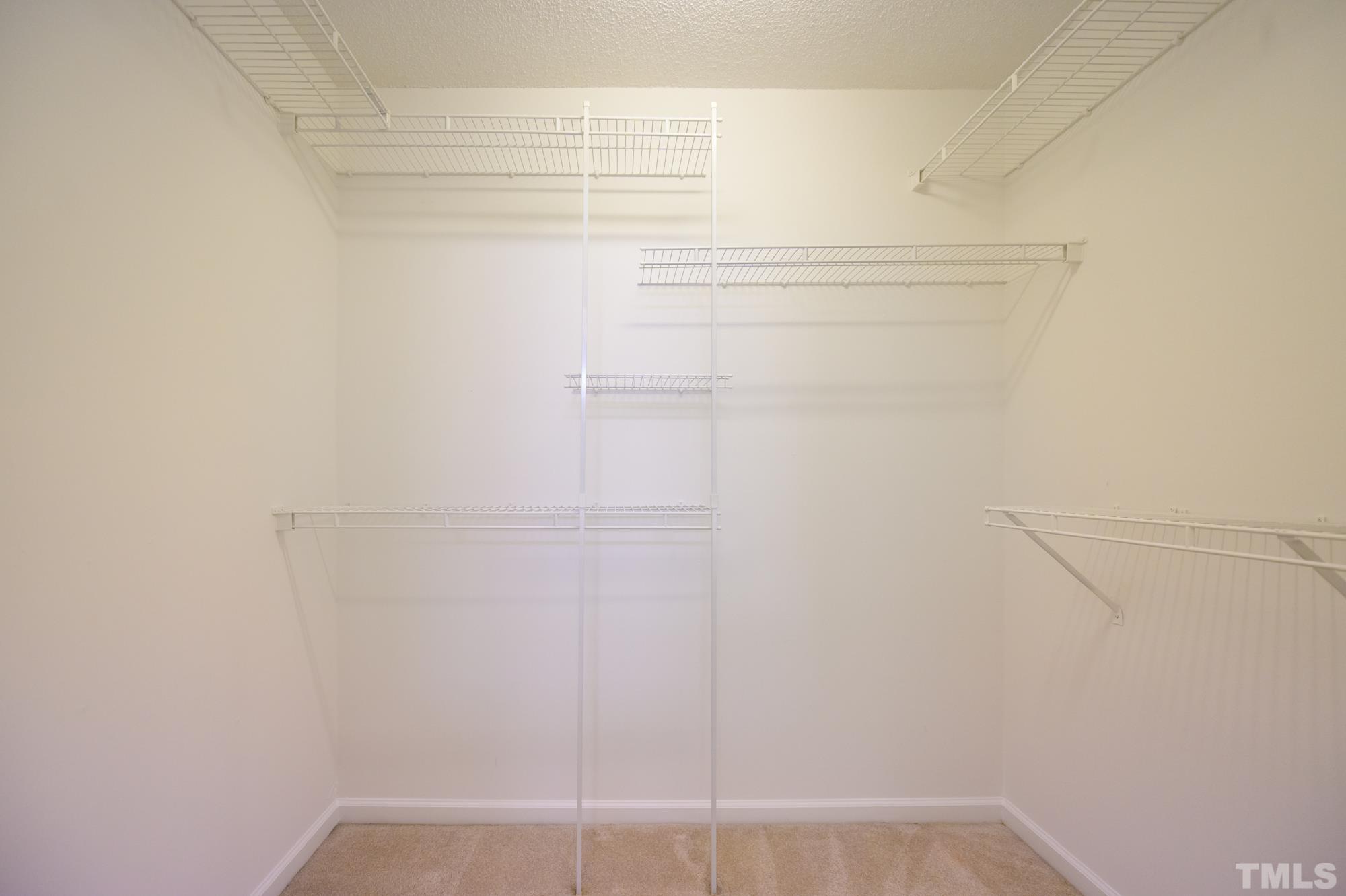 6809 Edwell Court Raleigh, NC 27617 - Photo 16 of 26 a close up view of racks on the wall