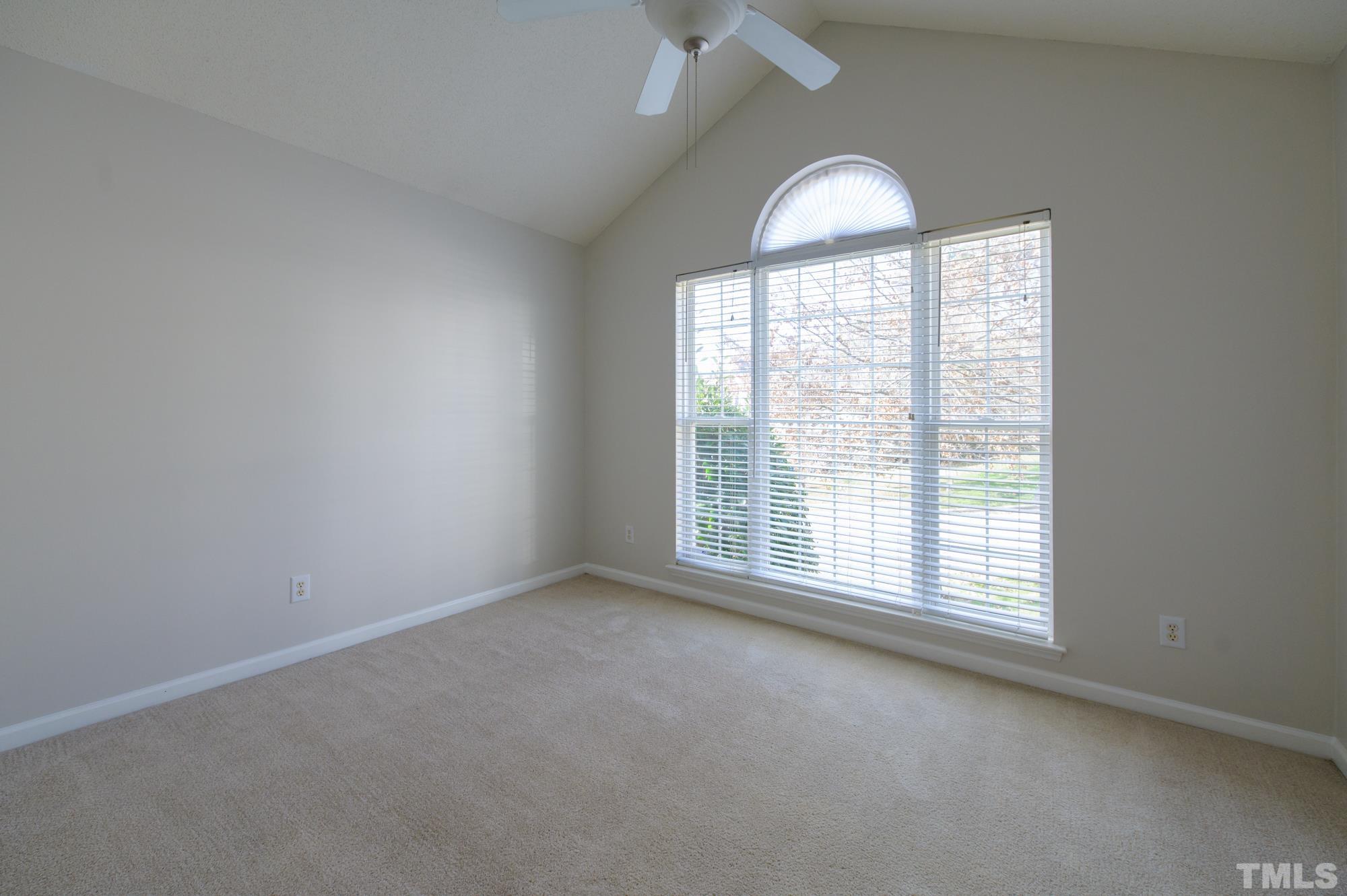 6809 Edwell Court Raleigh, NC 27617 - Photo 17 of 26 an empty room with a window