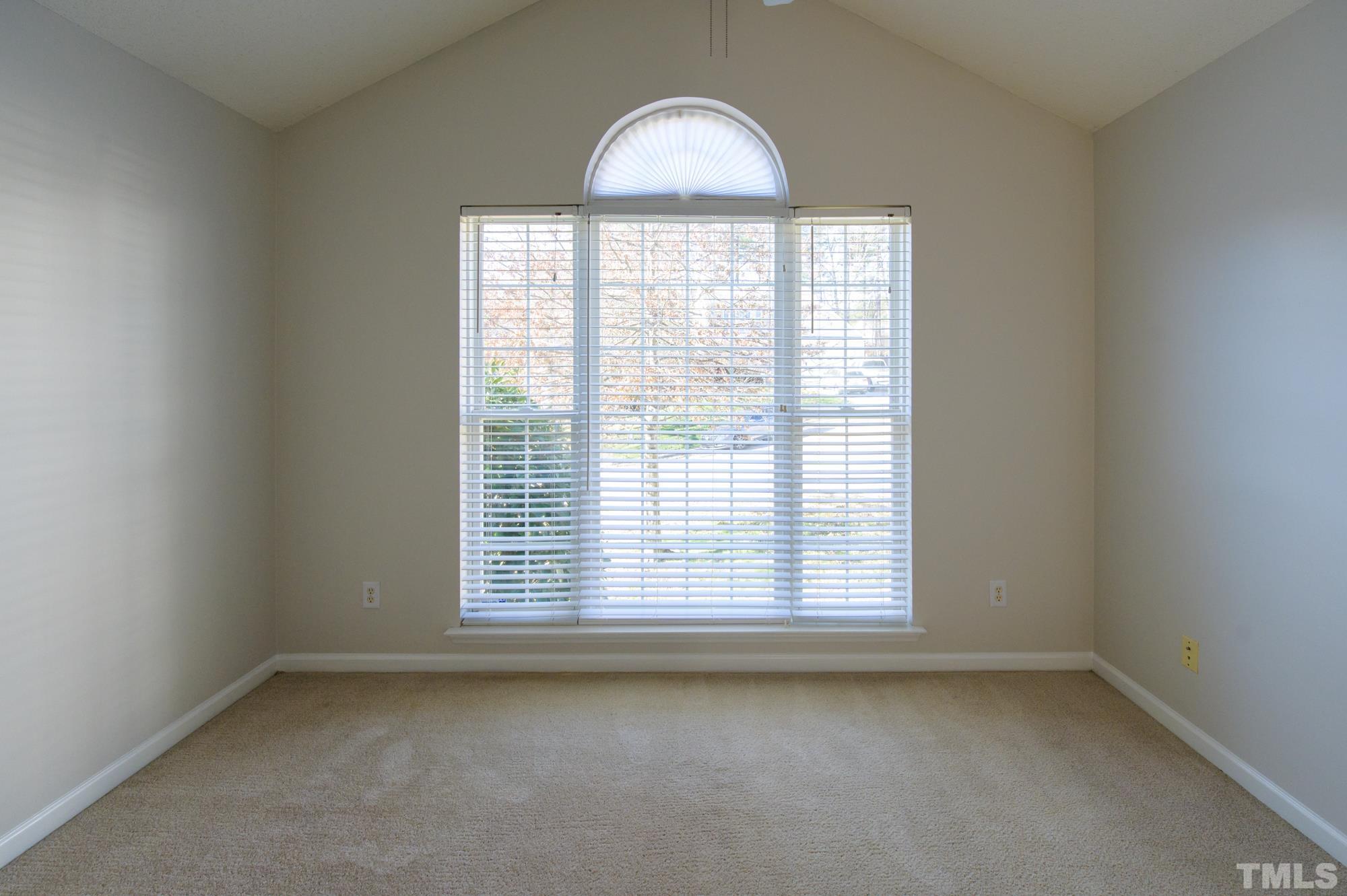 6809 Edwell Court Raleigh, NC 27617 - Photo 18 of 26 an empty room with a window